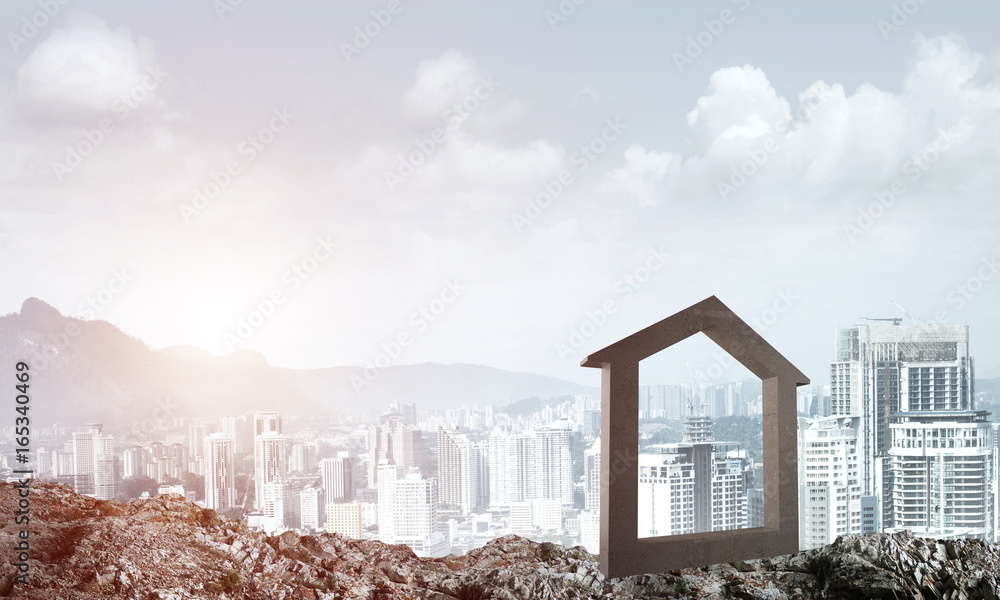 Conceptual image of concrete home sign on hill and natural landscape at background