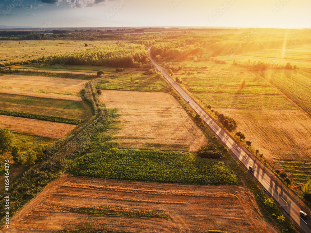 Beautiful aerial view of countryside and fields in sunset