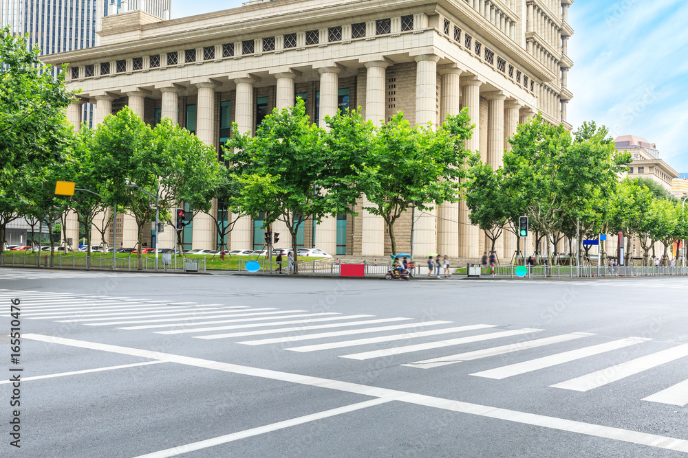 empty asphalt road and modern buildings in shanghai,china.