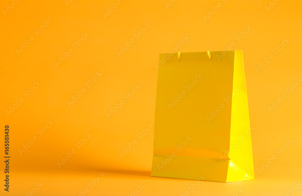 Gift bag on a bright yellow background