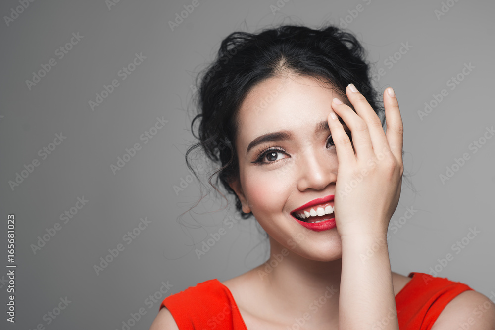 Fashion portrait of asian woman with elegant hairstyle. Perfect makeup.