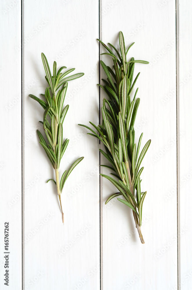 Rosemary on wooden background