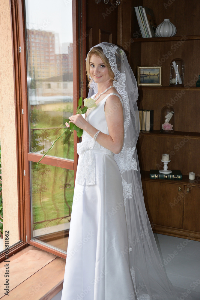 Beautiful, happy bride before the wedding.