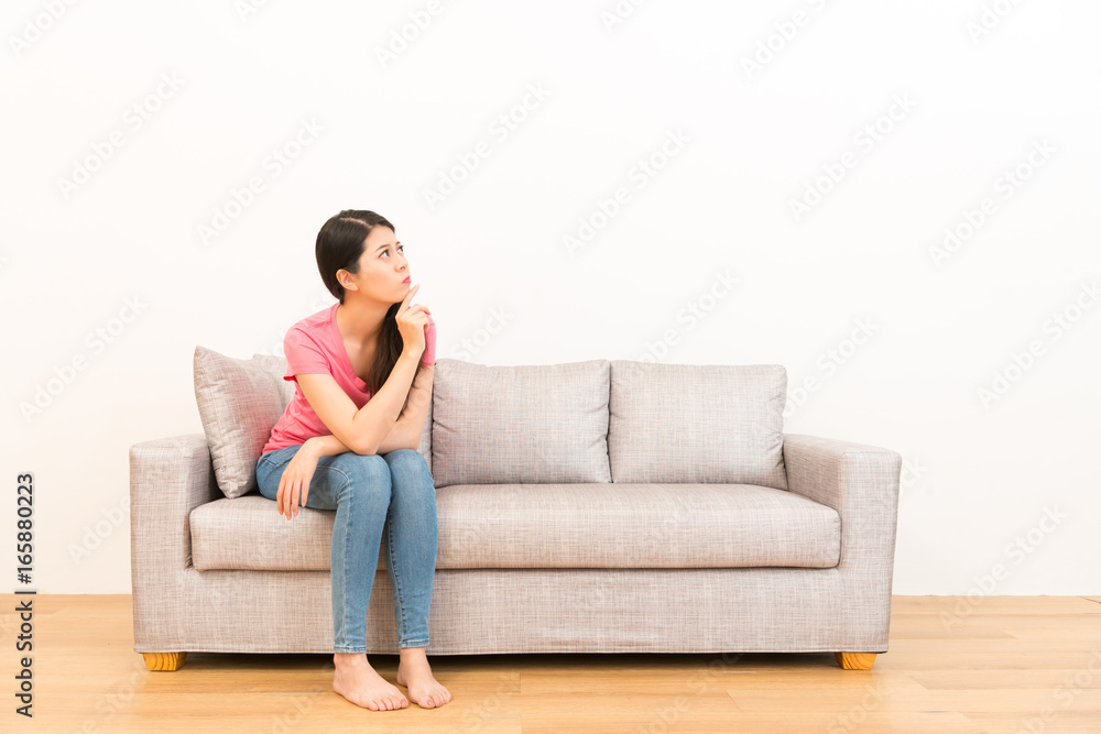 pretty casual woman sitting on the couch