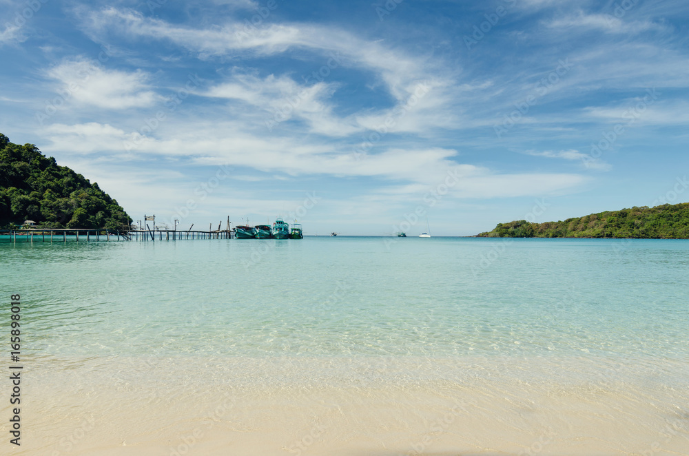 Tropical beach with boats and yacht at Andaman Sea in Phuket, Thailand. Summer, Travel, Vacation and