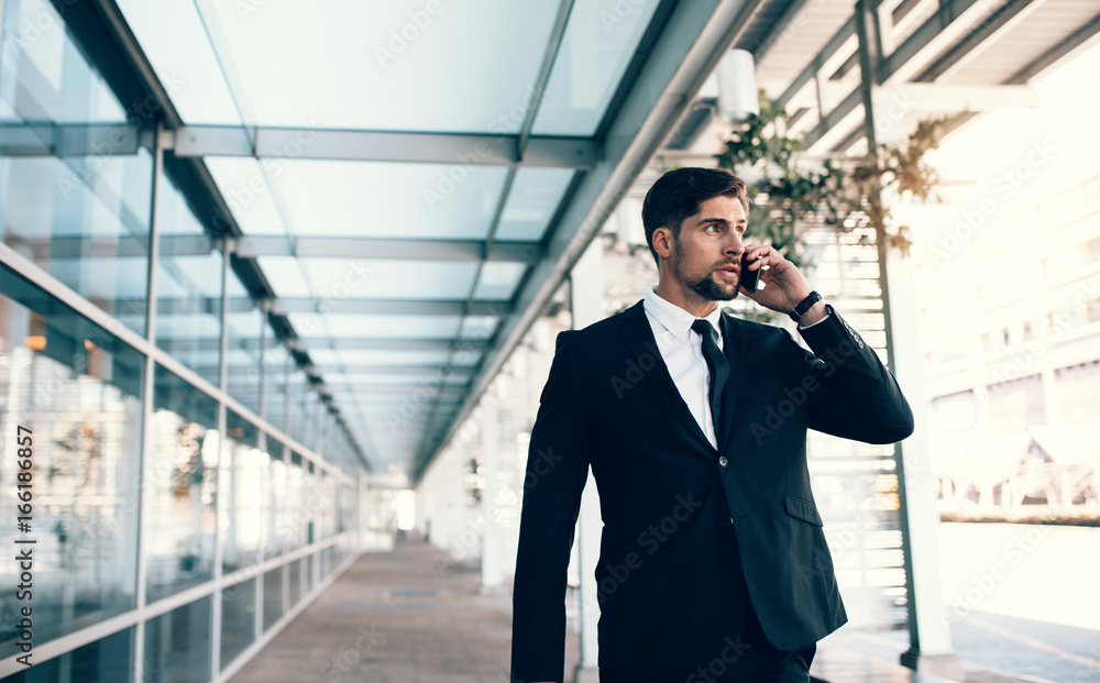 Businessman talking on mobile phone