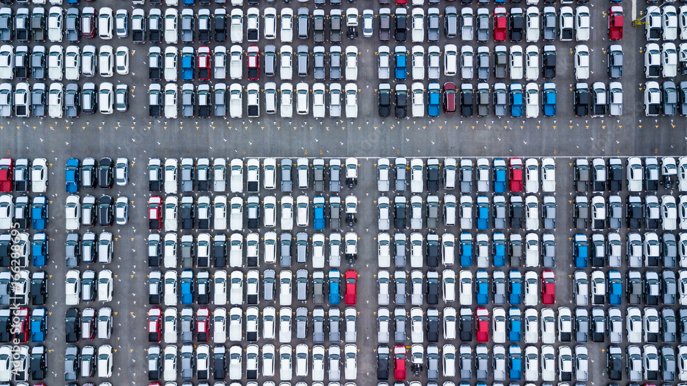 Aerial view new cars lined up in the port for import and export.