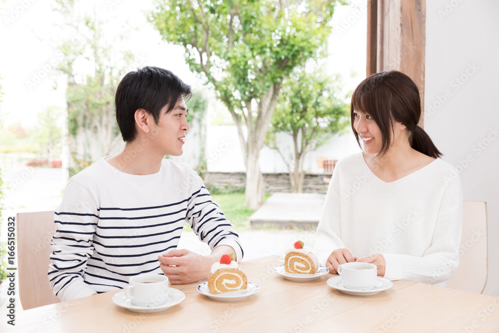 young asian couple relaxing in living room