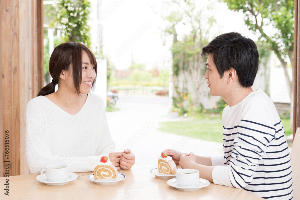 young asian couple relaxing in living room