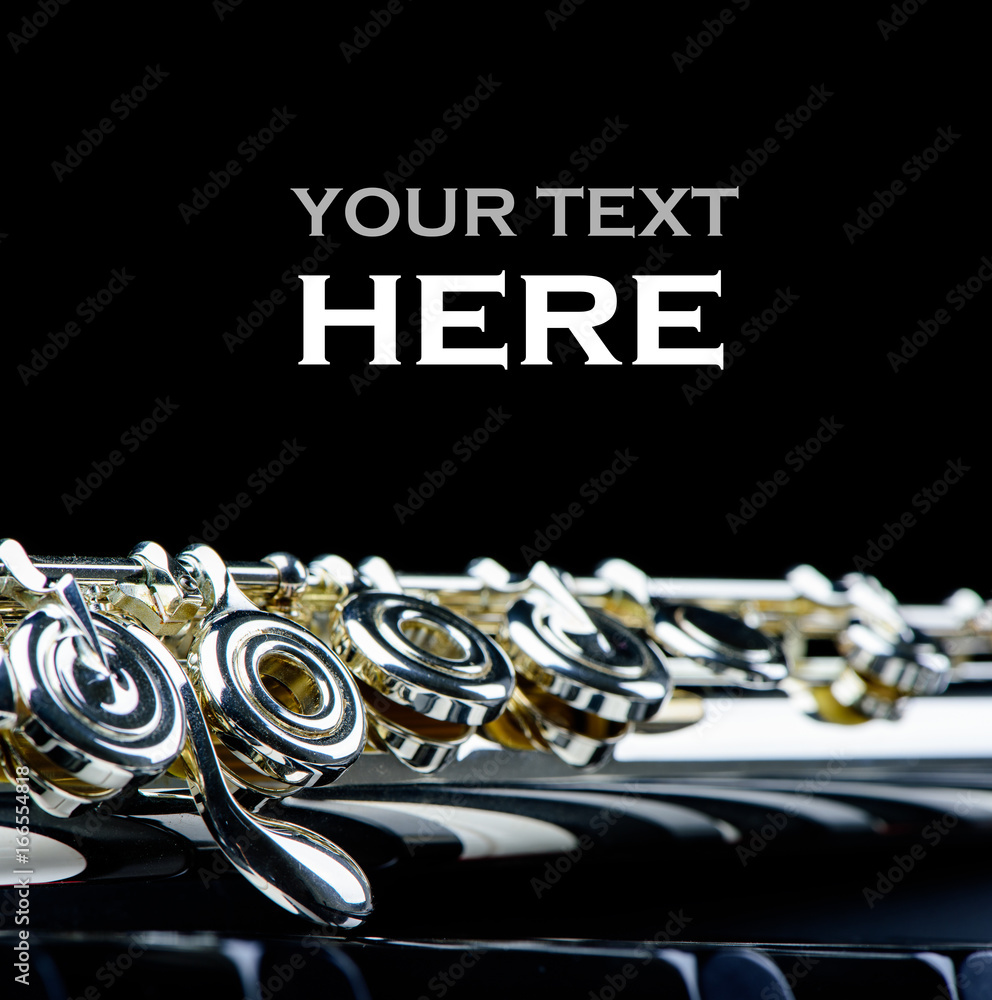 piano keyboard and flute instrument close up with place for  your text.