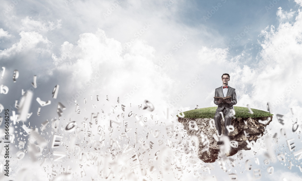 Young businessman or student studying the science and symbols fl