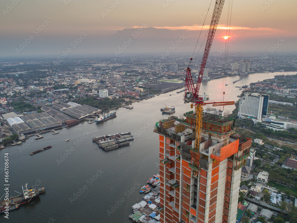 Construction site with cranes. Construction workers are building.Aerial view.Top view.