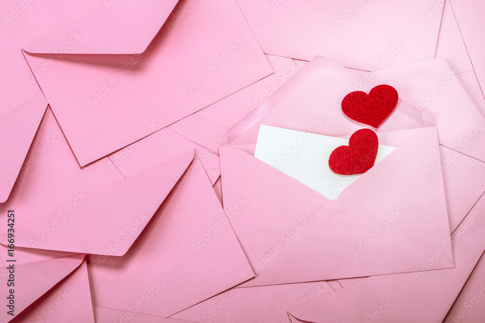 close up Stacking of pink envelopes and mail letter paper and red herat , the  romance  love letter 