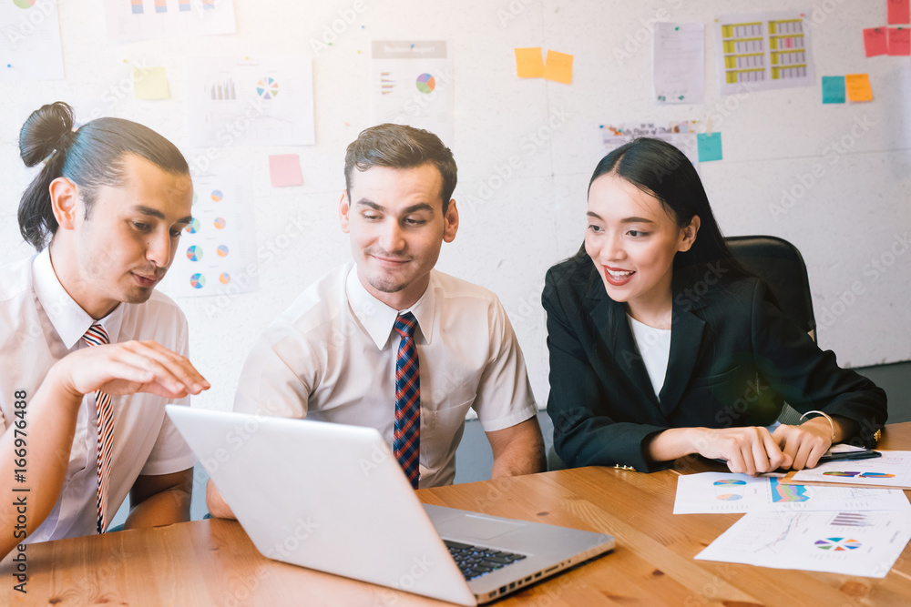 Group of business people happy creative team talking in modern office .Business team sharing their i