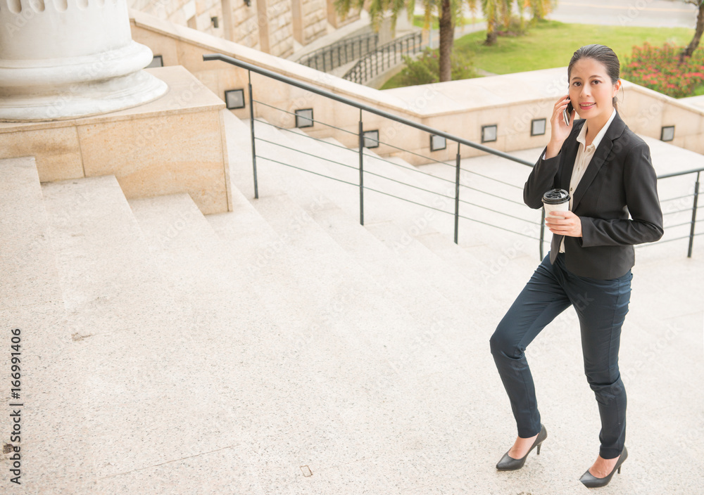 smiling business lawyer walking in court outdoor