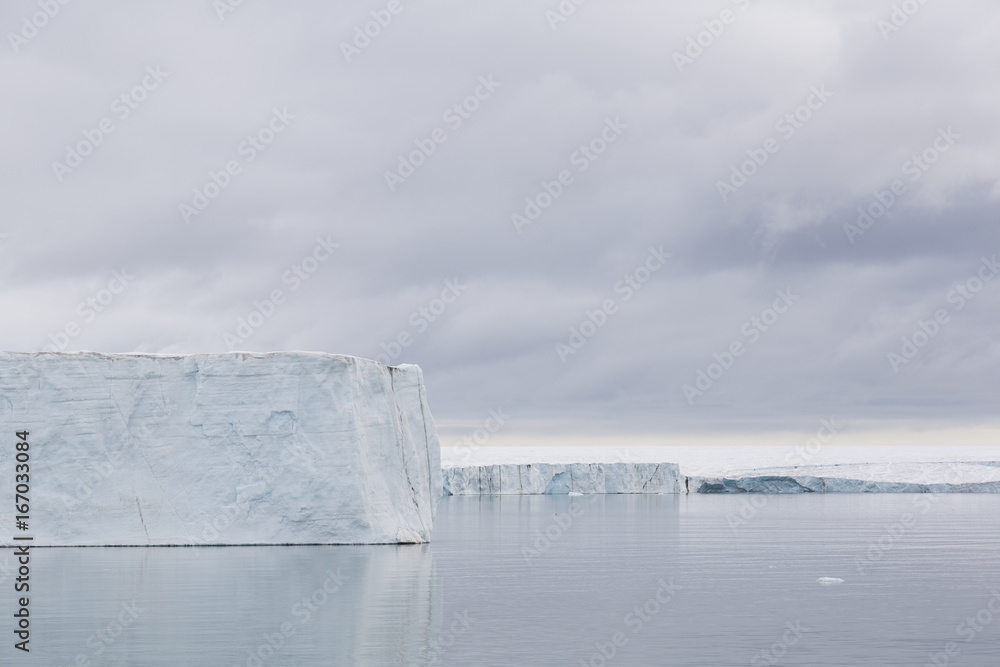 Iceberg floats in the polar sea of ​​Svalbard, Spitsbergen, Norway