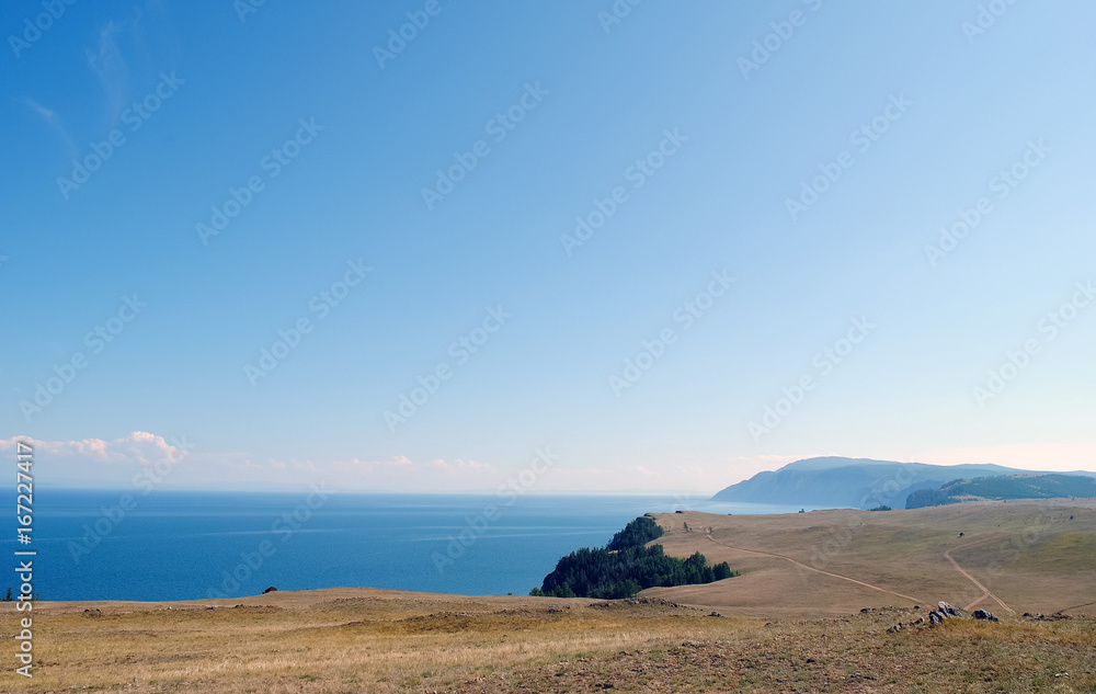 Baikal lake summer landscape, view from a cliff, Russia