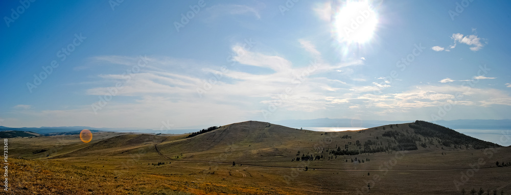 Baikal lake summer landscape, view from a cliff, Russia