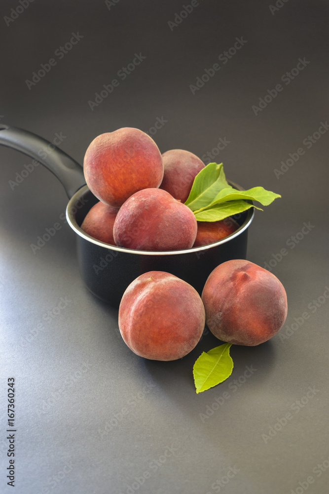 peaches lie in a pot