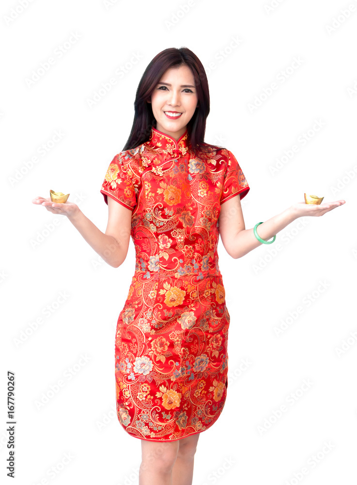 Chinese new year woman concept, isolated asian woman wearing red dress holding gold on hand