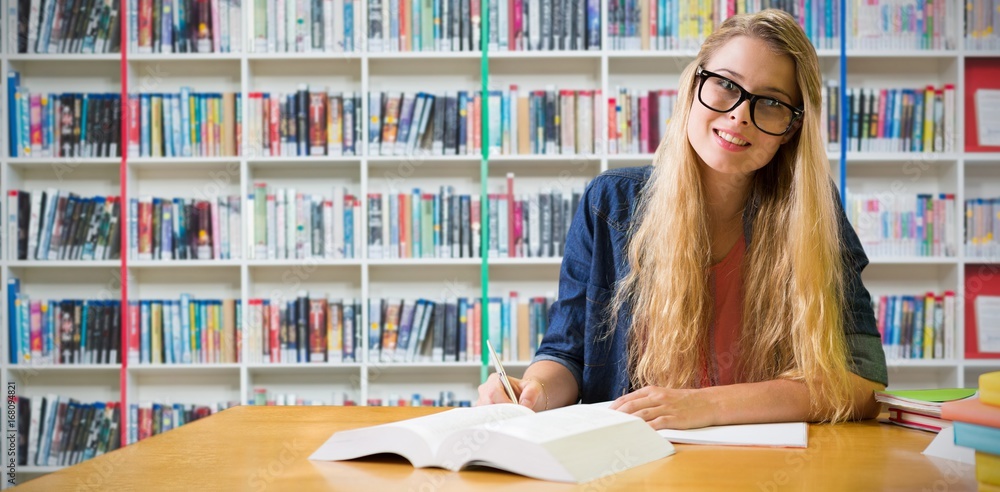 Composite image of student studying in the library 