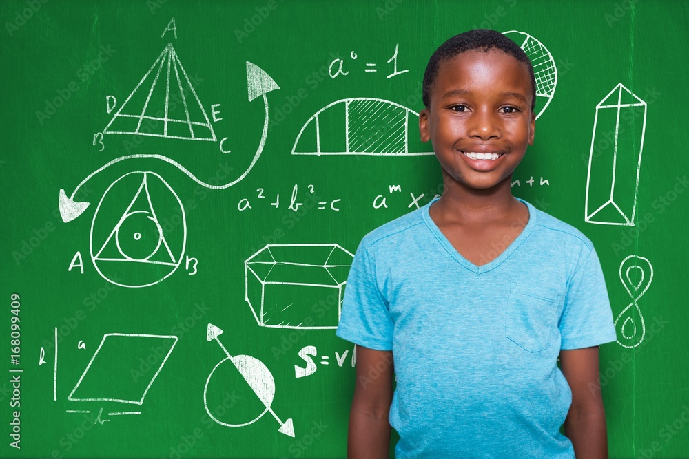 Composite image of portrait of smiling boy standing