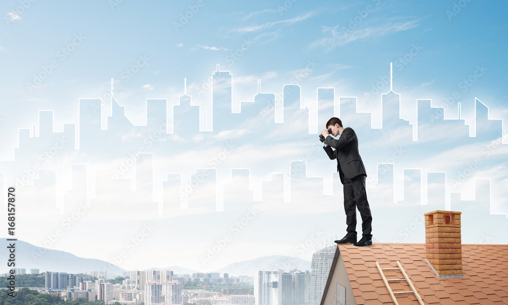 Businessman standing on roof and looking in binoculars. Mixed media