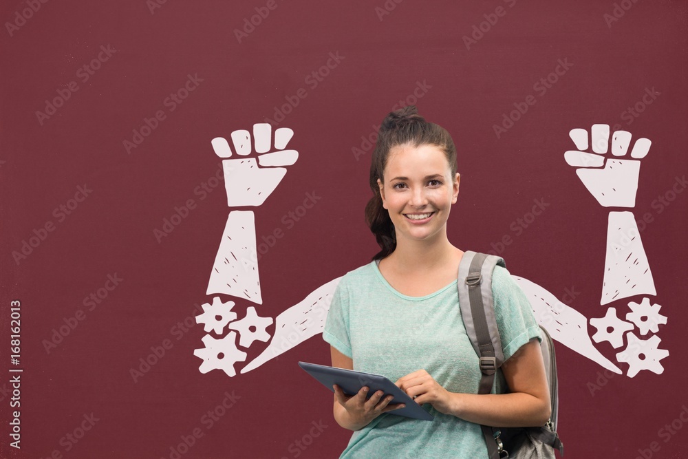 Happy student woman with fists graphic standing against red blac