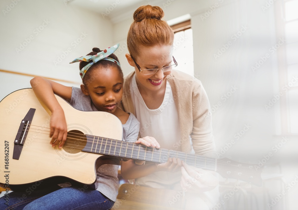 Music teacher with student