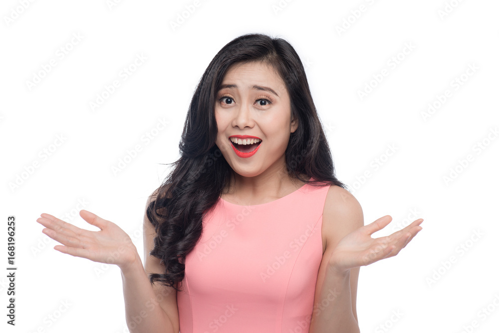 Surprised face of young asian woman over white.