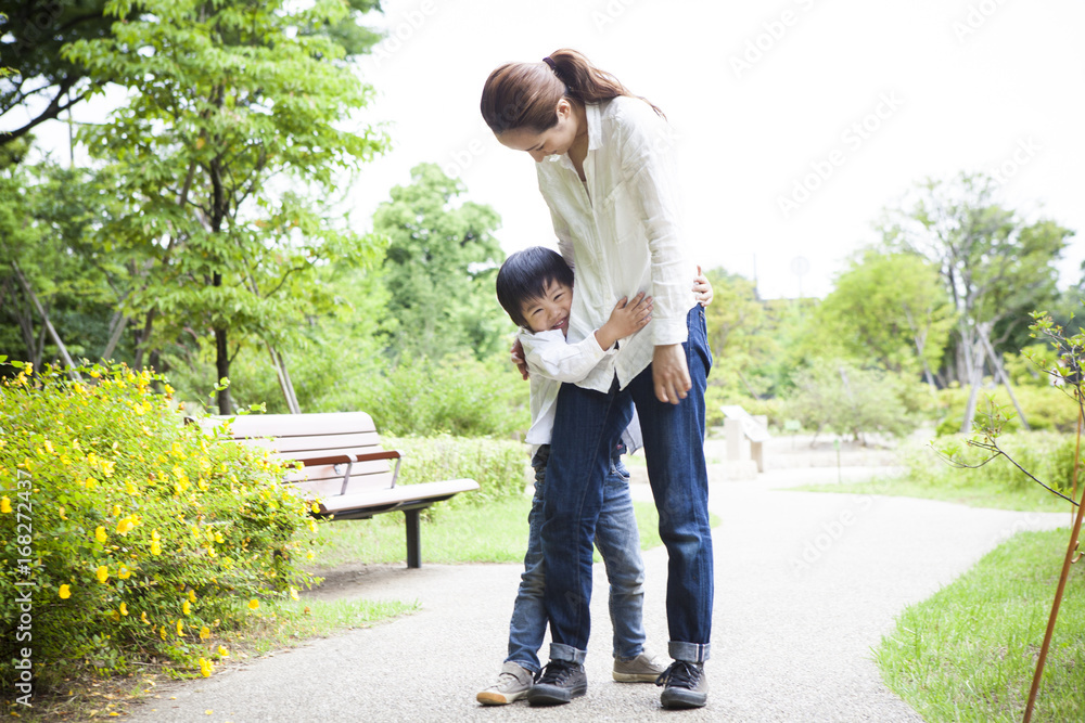 Boy are glad to be hug to his mother