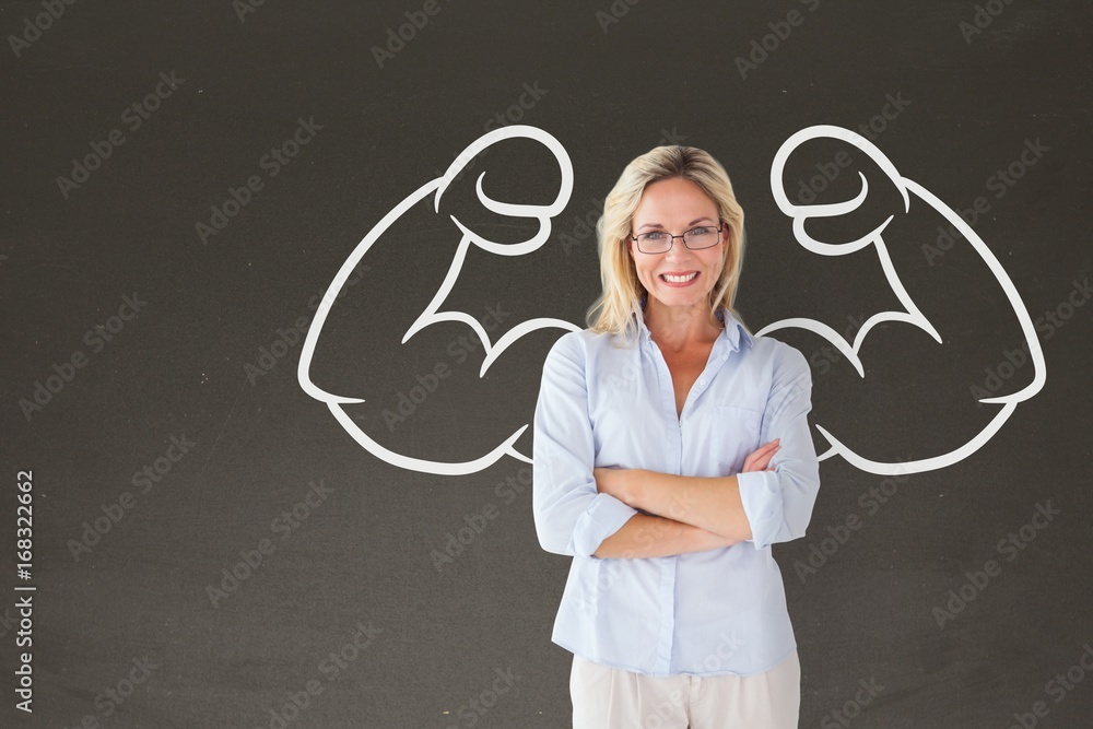 Happy student woman with fists graphic standing against grey bla