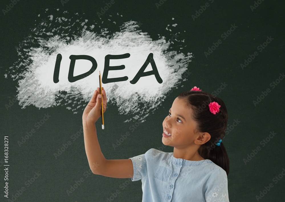 Student girl at table writing against green blackboard with idea