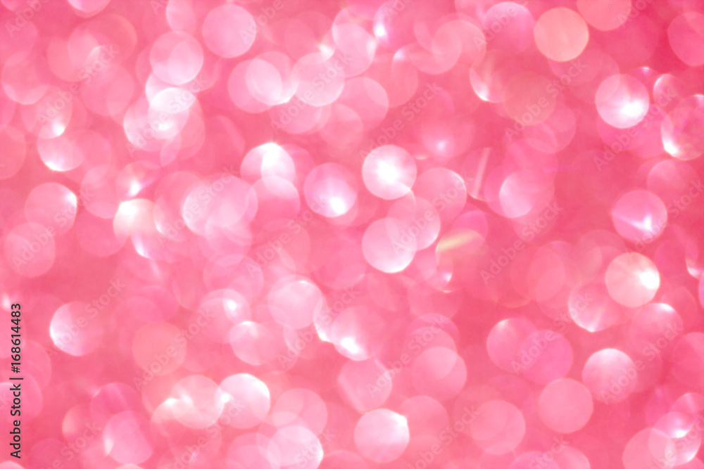 The abstract pink bokeh background