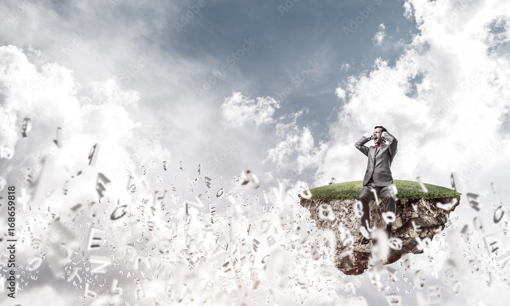 Young man floating in sky and dont want to hear anything