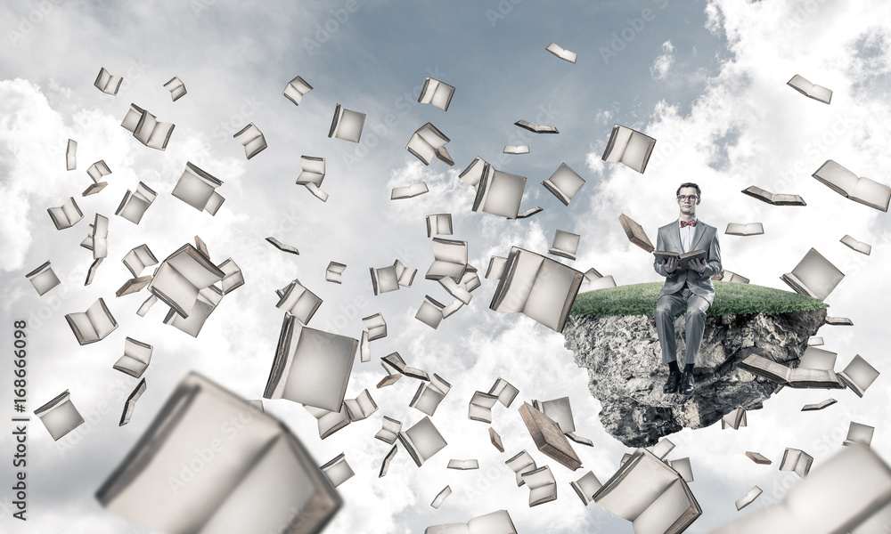 Young businessman or student studying the science and books fly 