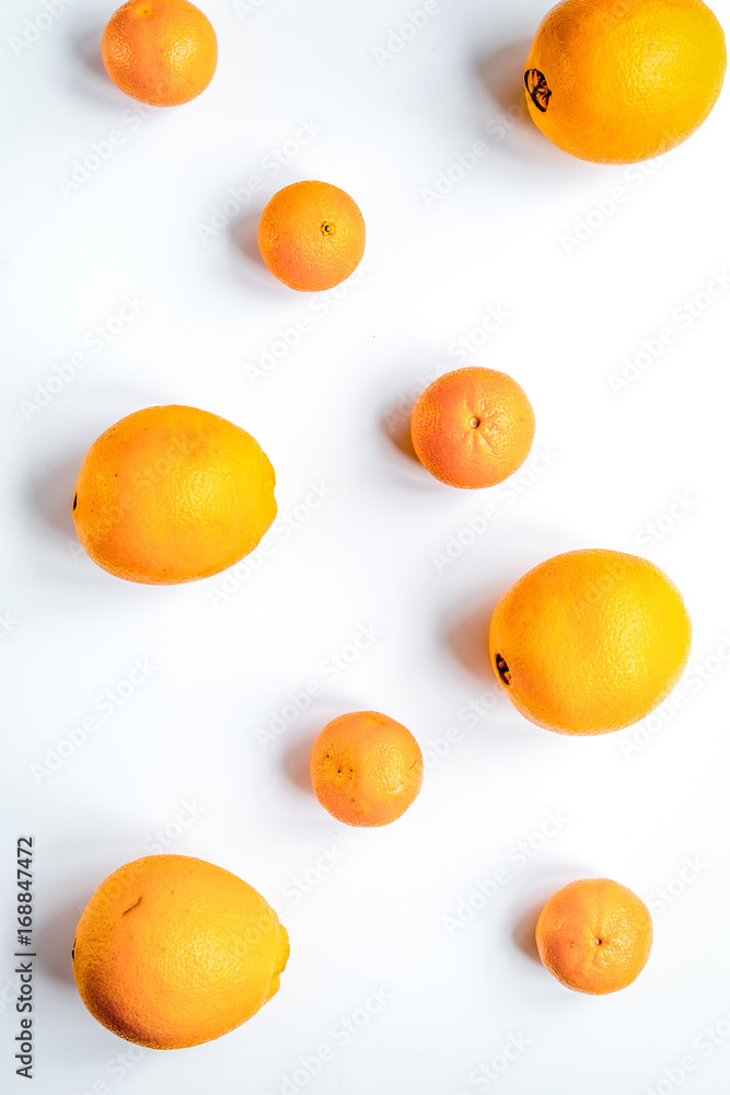 fresh orange fruit on white background top view pattern