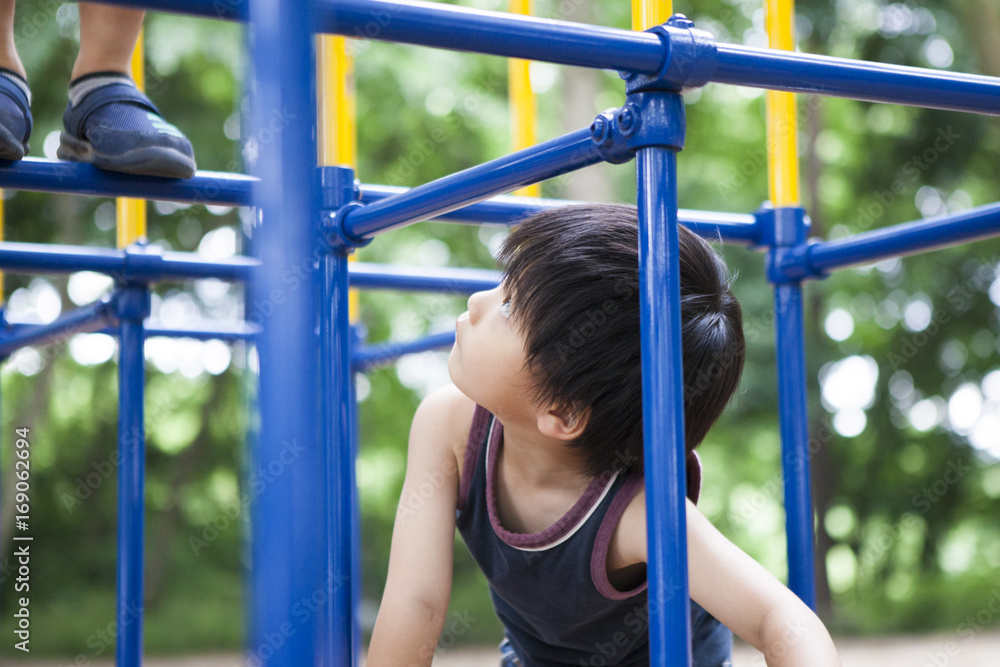 A boy looking up from athletics