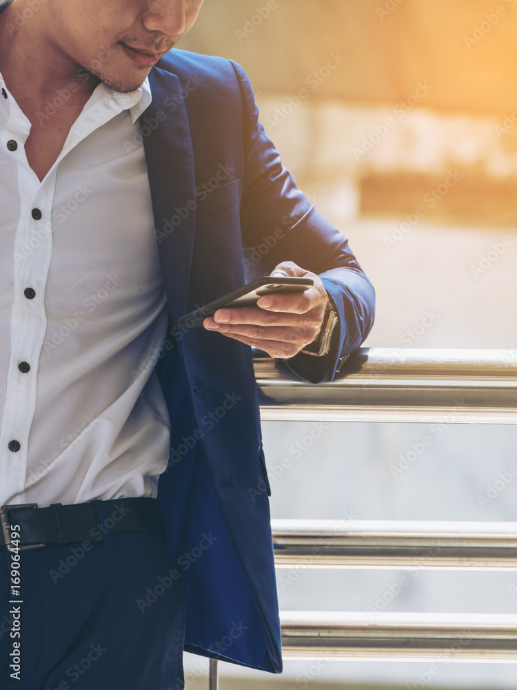 Business man using smartphone