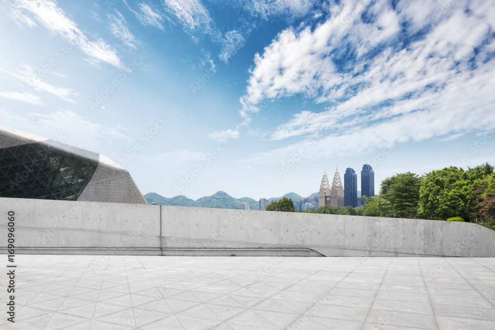 empty marble floor and cityscape of modern city