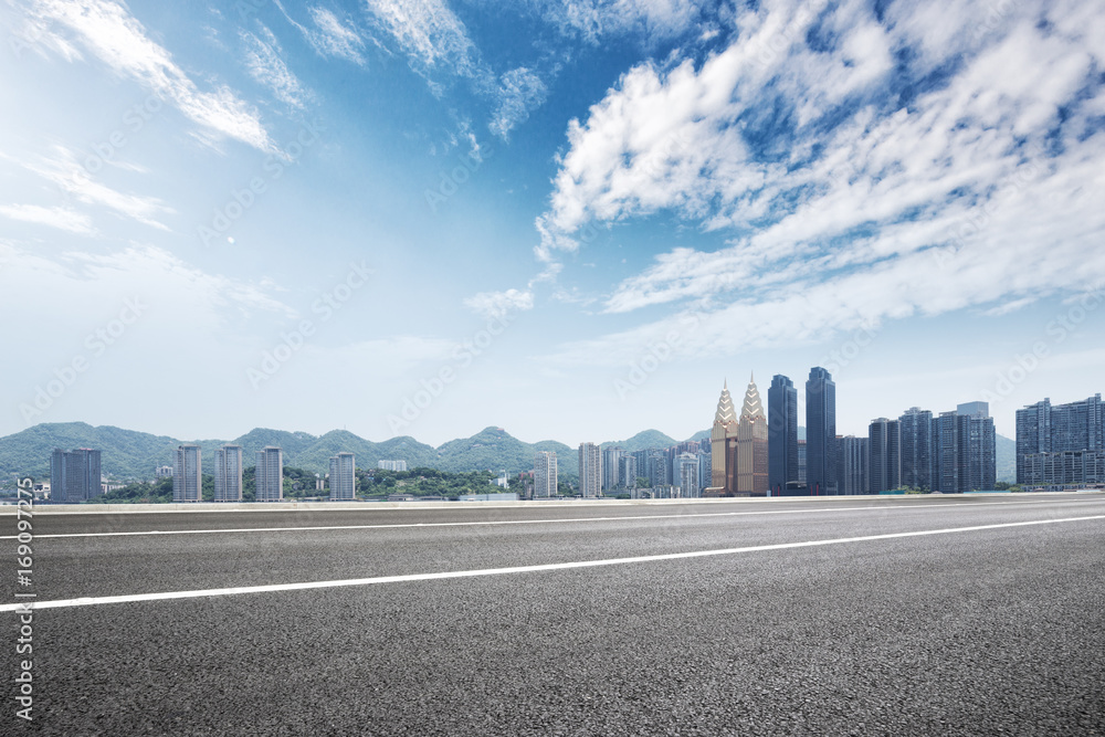 empty road and cityscape of modern city