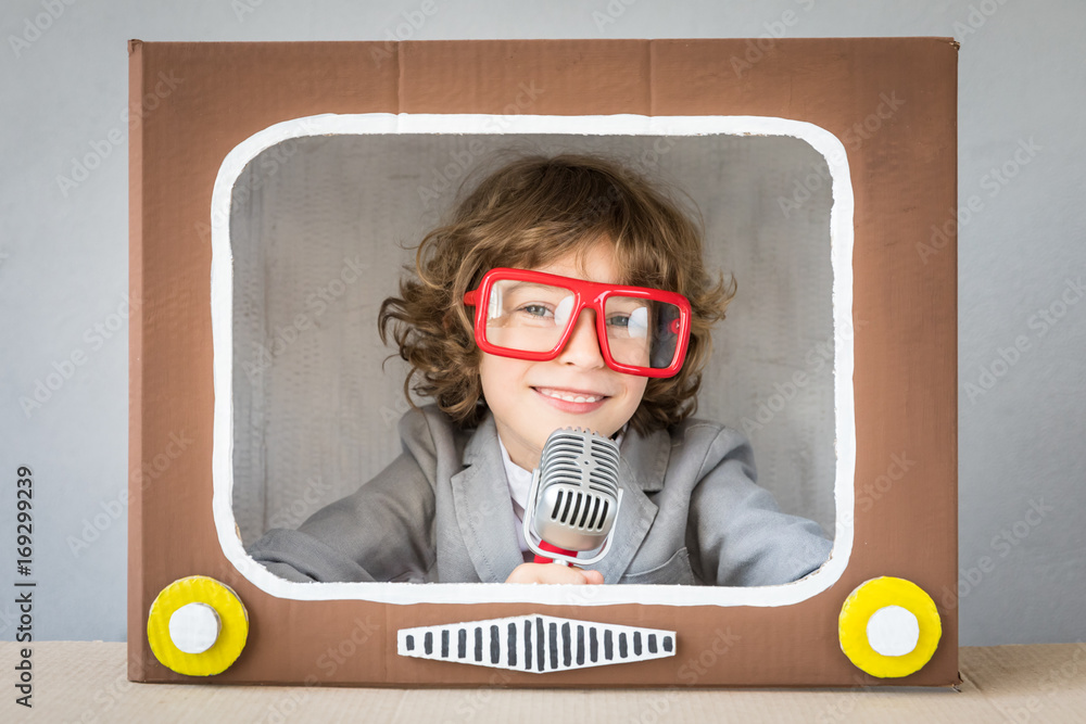 Child playing with cartoon TV