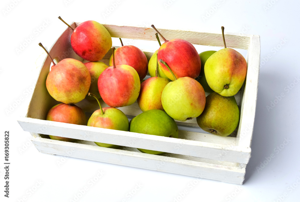 Fresh  picked apples in a wooden box