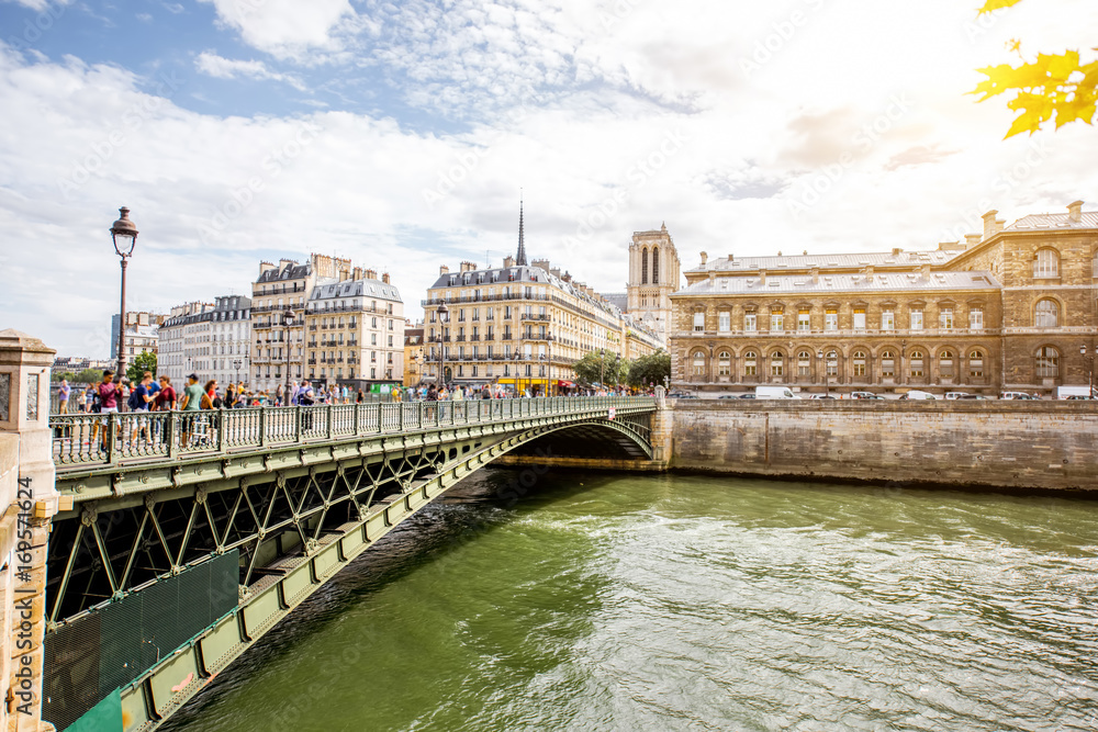 Landscape view on the riverside with Notre Dame basilica in Paris