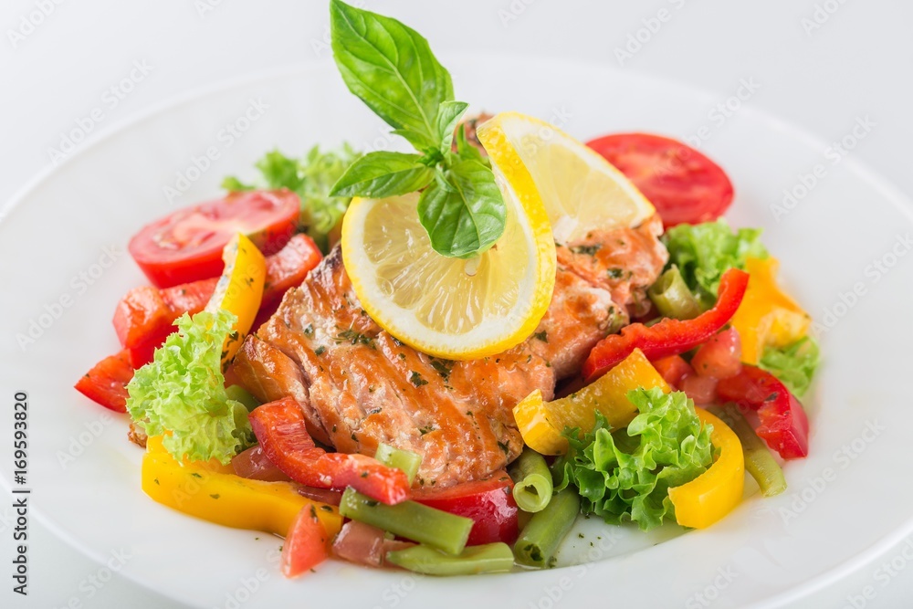 Fried fish with vegetables.