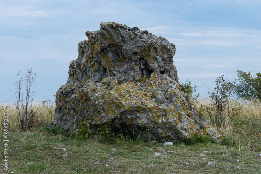 Big rock on the sky as a background