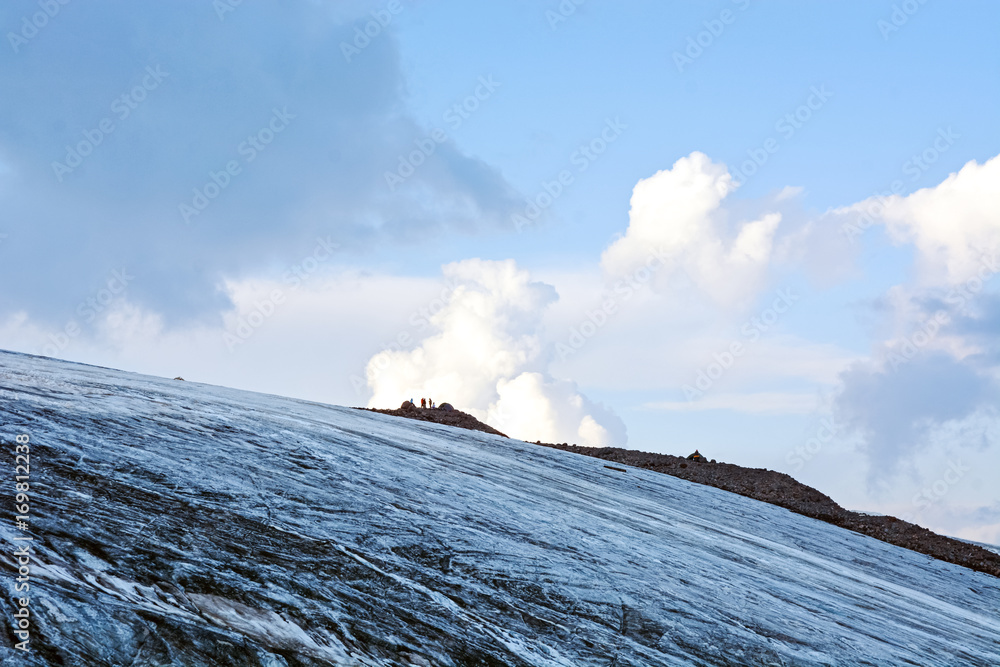 Snow covered Elbrus mountains at winter sunny day