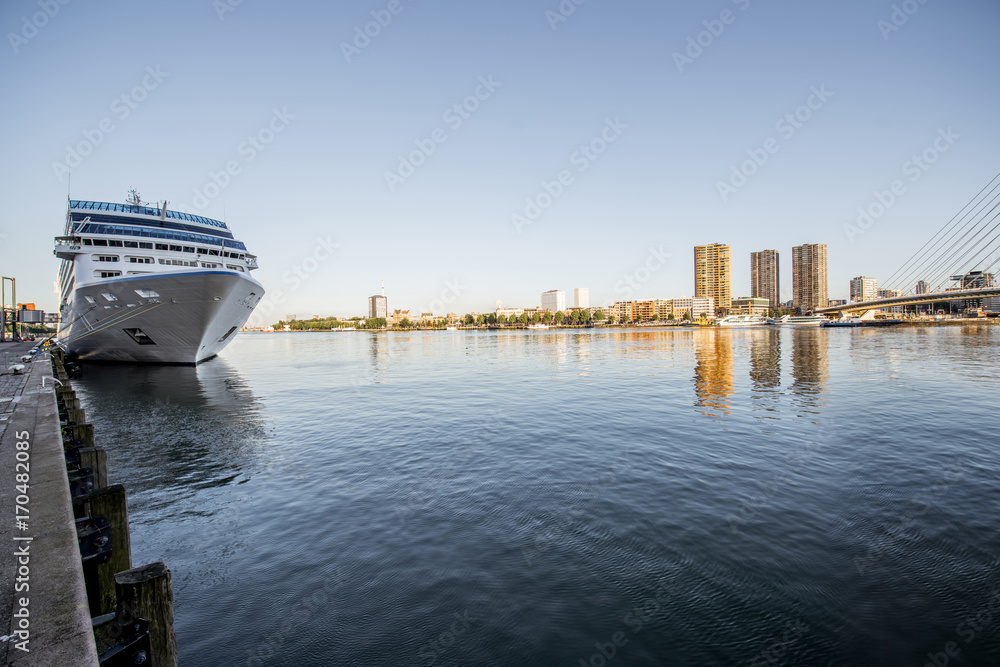 Landscape view on the river with cruise liner near the Rotterdam terminal in Netherlands