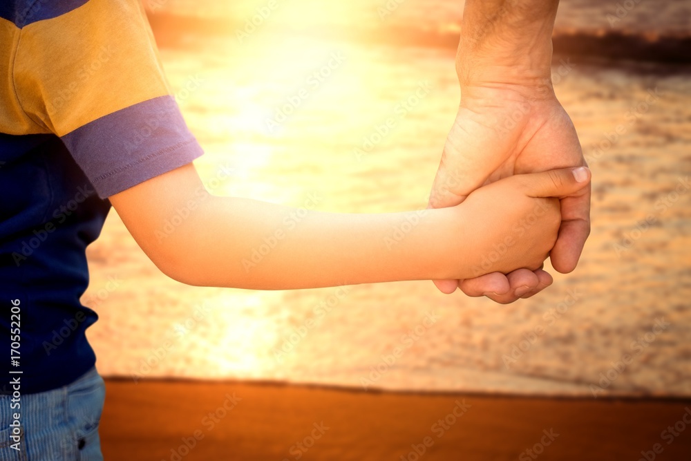 Parent and child holding hands