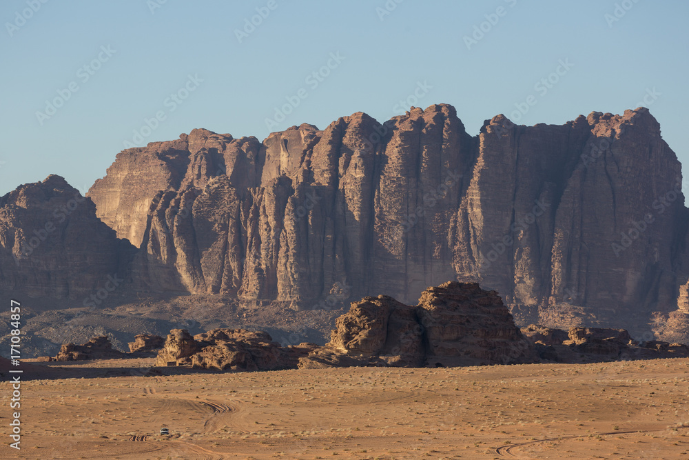 Wadi Rum (The Moon Valley) desert landscape at sunset time, Jordan